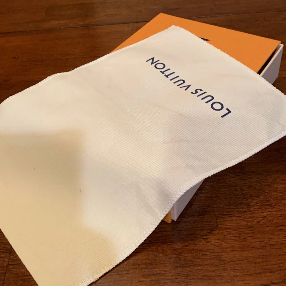 Authentic brand new Louis Vuitton Cream and Blue Dust Bag, small size, rare